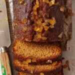 Close up view of a sticky ginger loaf cake.