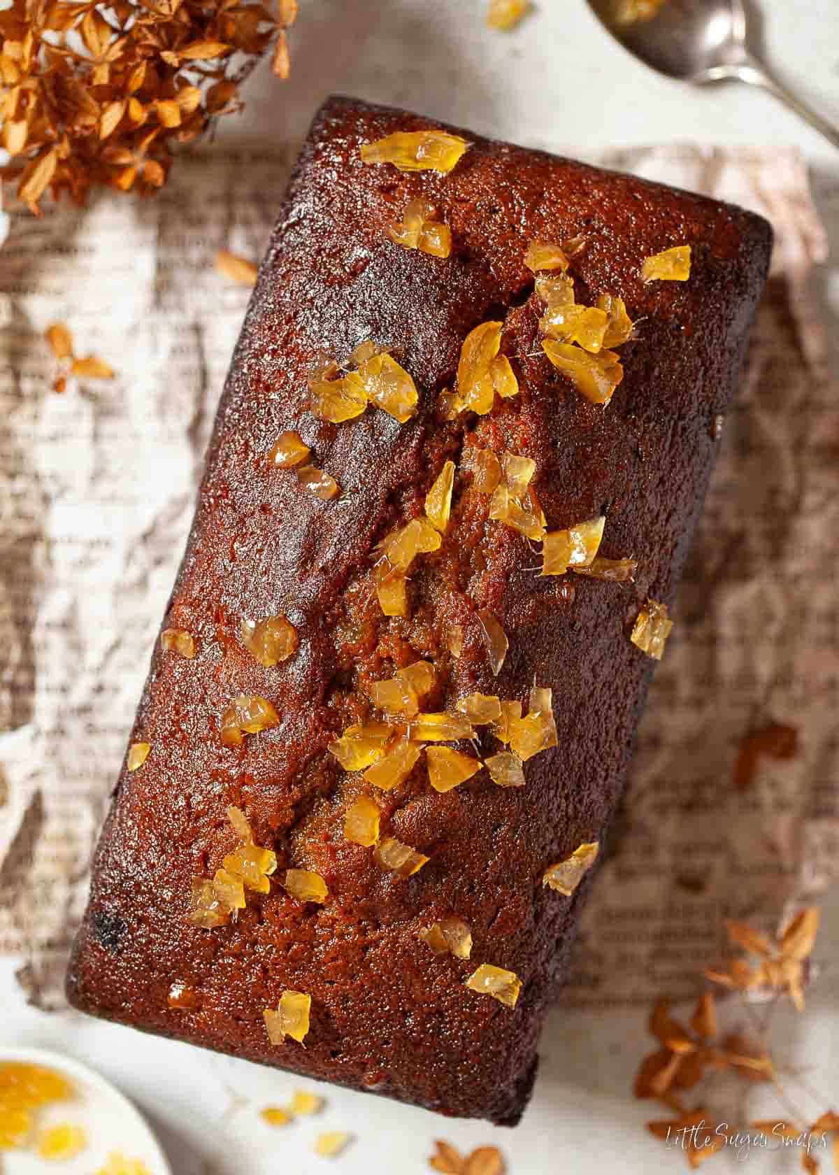 Sticky ginger cake topped with chunks of stem ginger.