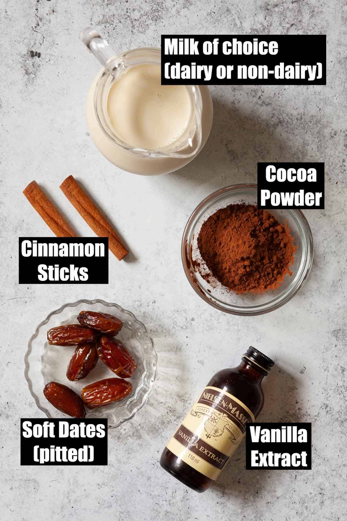 Labelled ingredients for a healthy cocoa drink sweetened with dates.