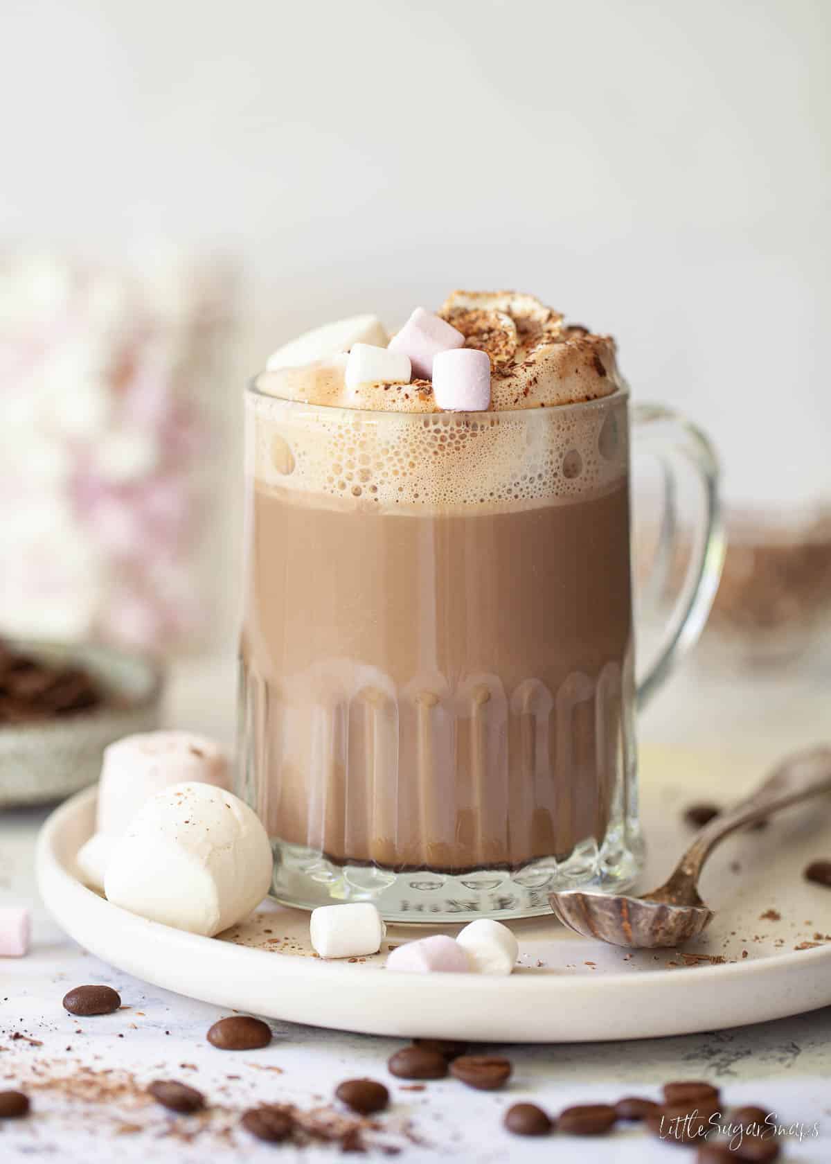 A Baileys mocha latte with cream and marshmallow topping.