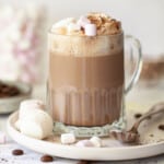 Close up of a chocolate, Baileys and coffee drink with cream and marshmallow toppings.