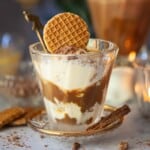 Close-up of affogato al caffè dessert garnished with stroopwafel cookie.