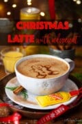 Labelled image of a Christmas coffee in a mug with a gingerbread stencilled on top.