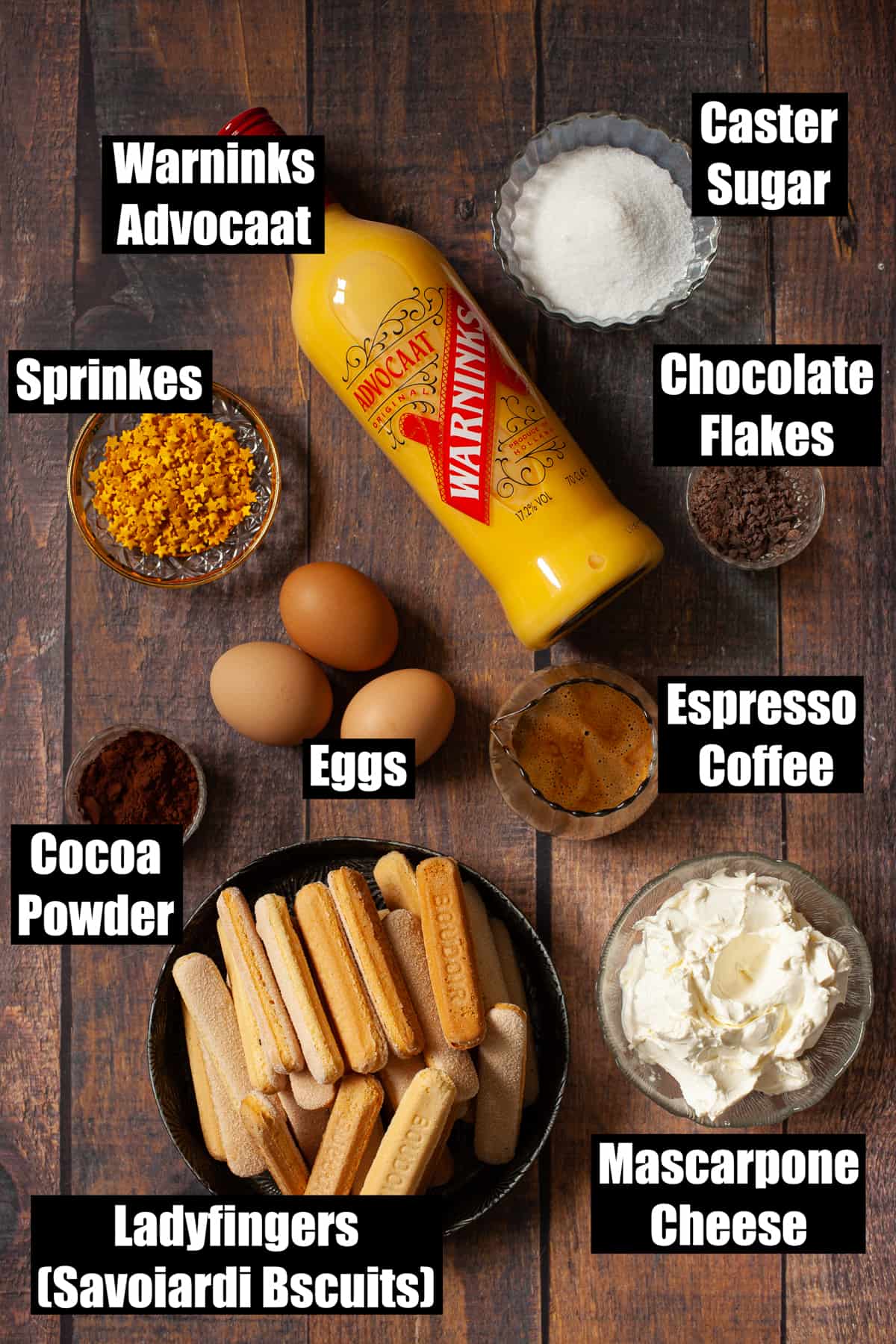 Labelled ingredients for tiramisu cups with advocaat liqueur.