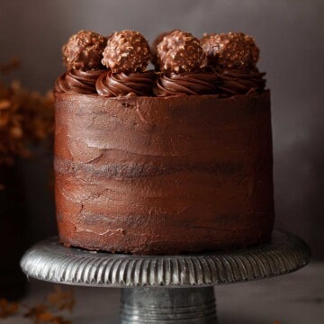 Close up of a Ferrero Rocher Chocolate Cake with whipped ganache.