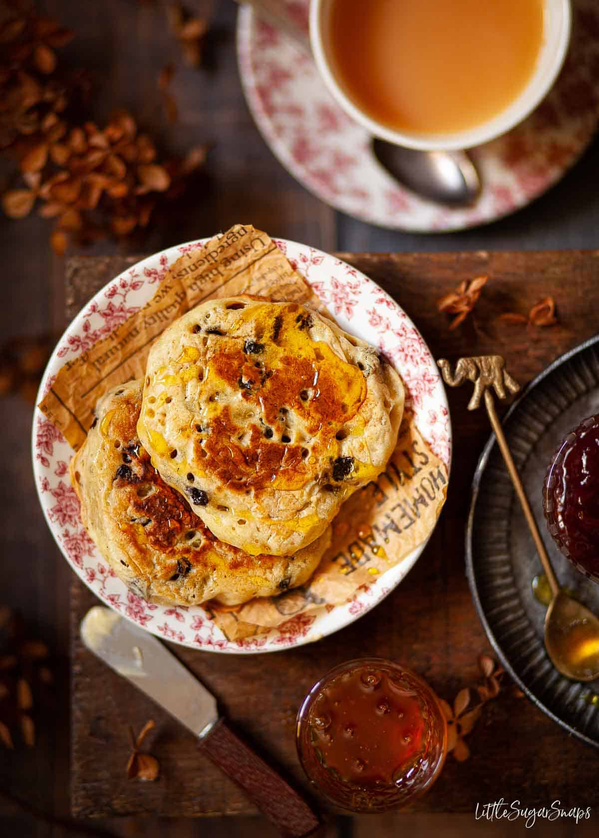 Staffordshire fruit pikelets studded with currants and drizzled with golden syrup.