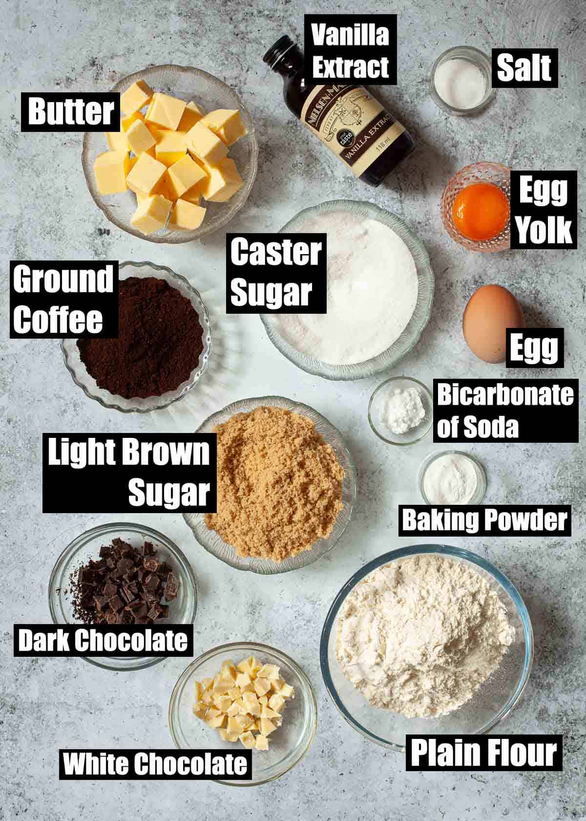 Ingredients for a biscuit recipe with chocolate and espresso.