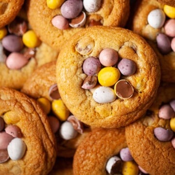 Close up of biscuits topped with Easter chocolates.