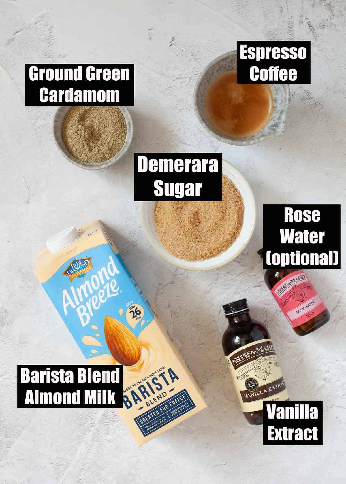 Labelled ingredients for a dairy-free cardamom coffee drink.