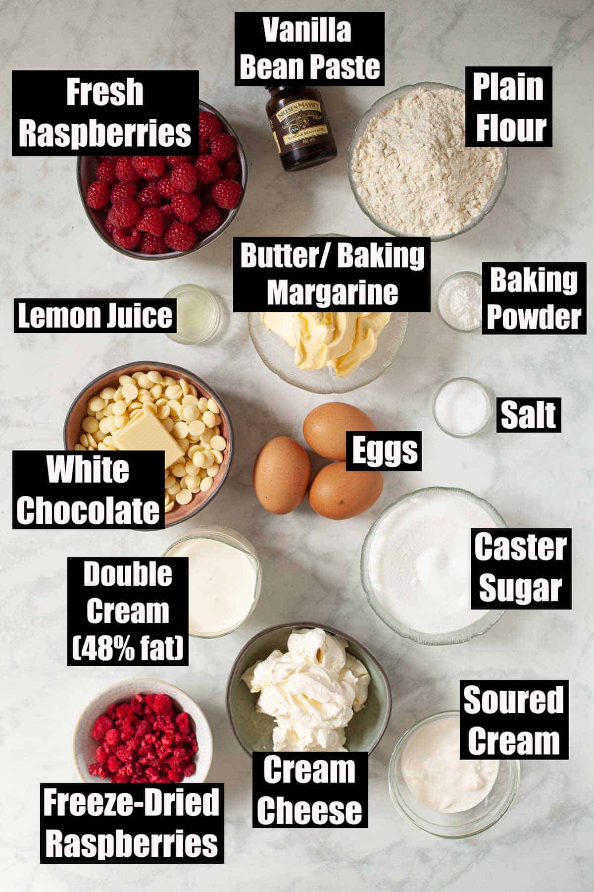 Labelled ingredients for a raspberry layer cake with cream cheese frosting.