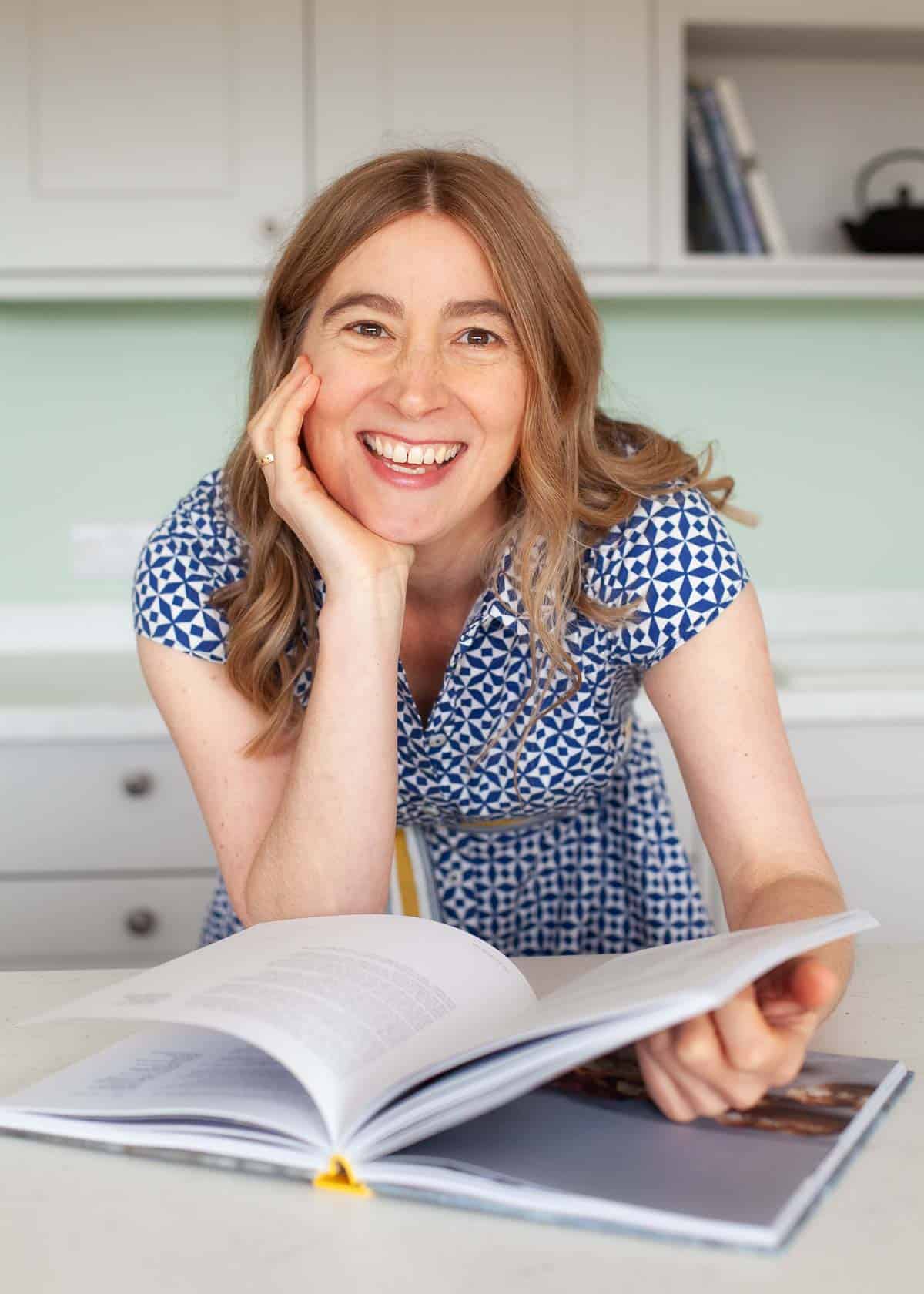 Food blogger and food photographer Jane Coupland (formerly Jane Saunders) in a blue dress.