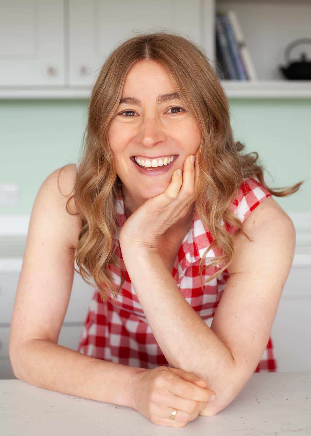 Food blogger and food photographer Jane Coupland (formerly Jane Saunders) in a red dress.