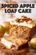 A cut into apple and raisin loaf cake with text overlay.