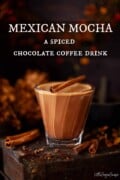 Labelled image of a Mexican chocolate and coffee mocha drink in a cosy setting.