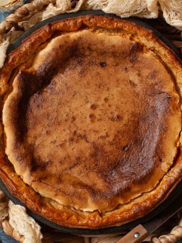 Close up of a whole Bakewell tart.