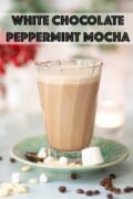 A glass of peppermint coffee with marshmallows at the side plus text overlay.