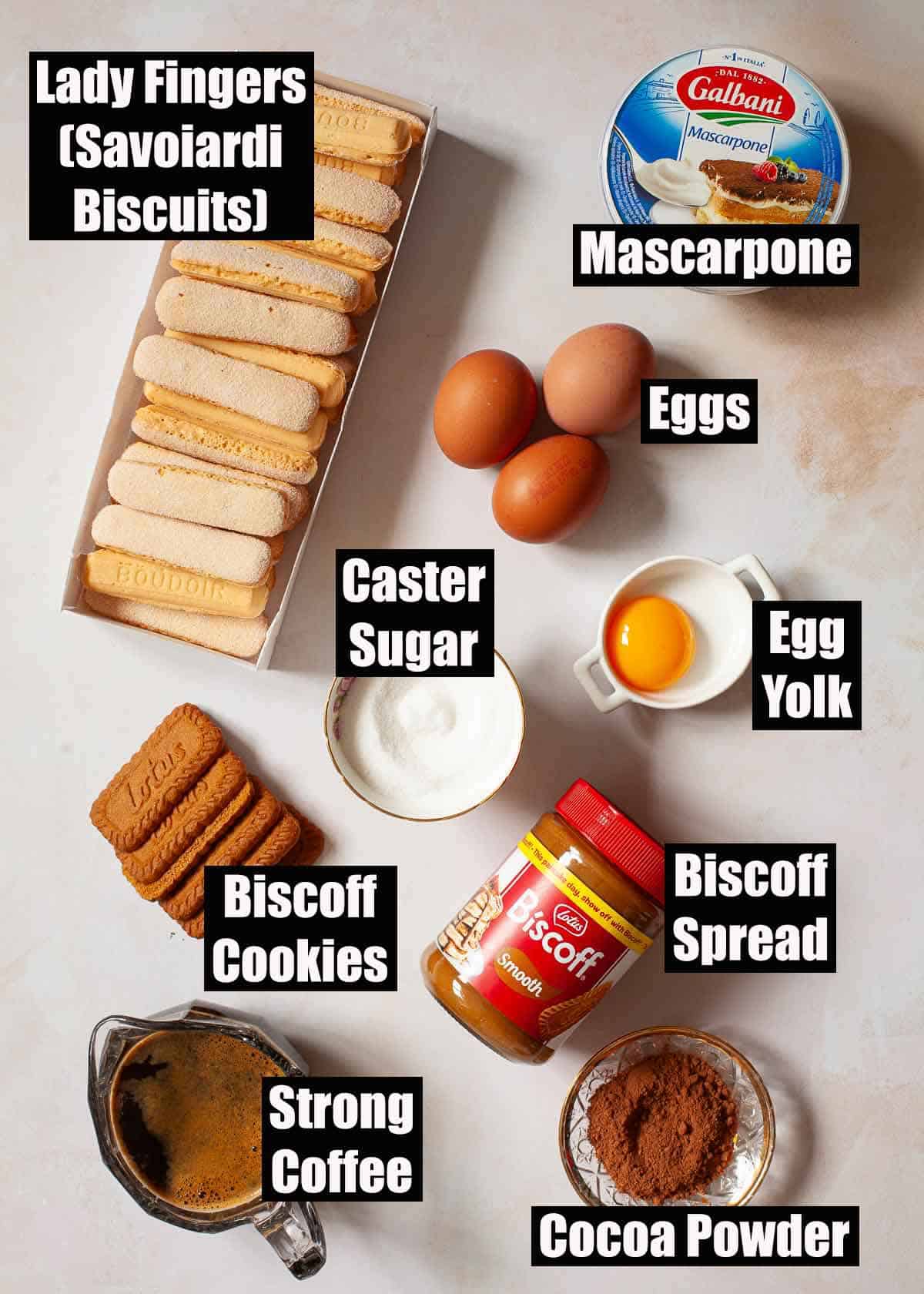 Labelled ingredients for a creamy Biscoff dessert featuring mascarpone, coffee and savoiardi biscuits.