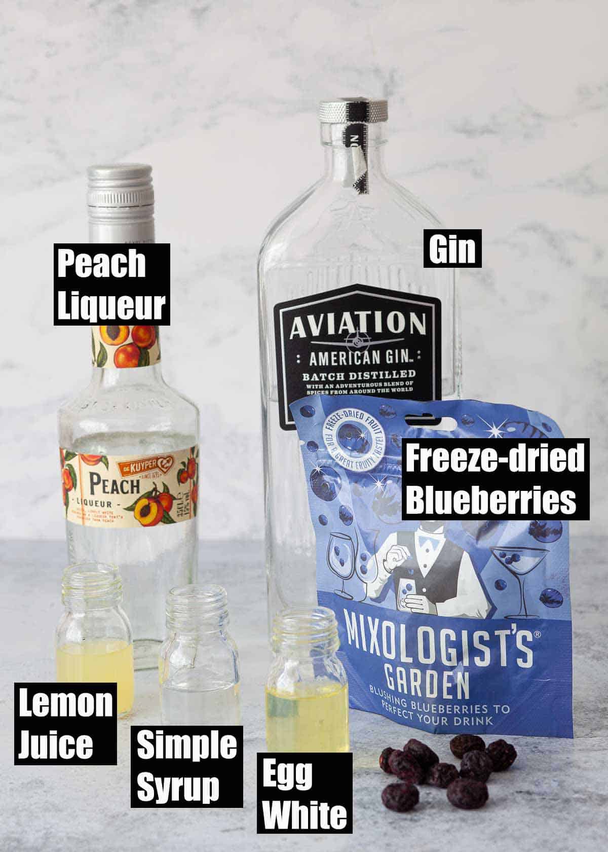 Ingredients for an alcoholic drink with text labels.