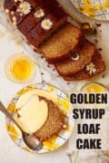 A slice of golden syrup cake with custard poured over the top of it with text overlay.