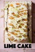 Lime cake with drizzle topping and icing with text overlay.