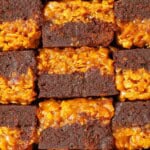 Close-up of brownies topped with a layer of caramel covered cornflakes.