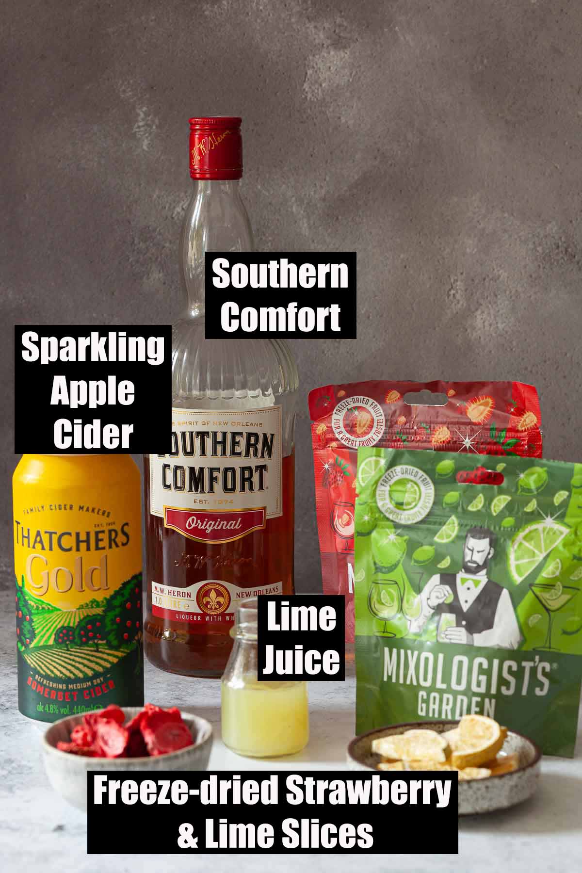 Ingredients for a cocktail made with Southern Comfort and cider with text overlay.