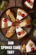 Labelled image of slices of sponge cake with pastry base and a layer of jam.
