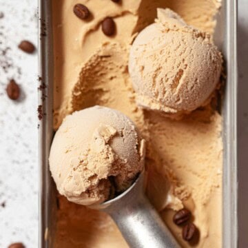 Close up of coffee flavoured ice cream in a pot.