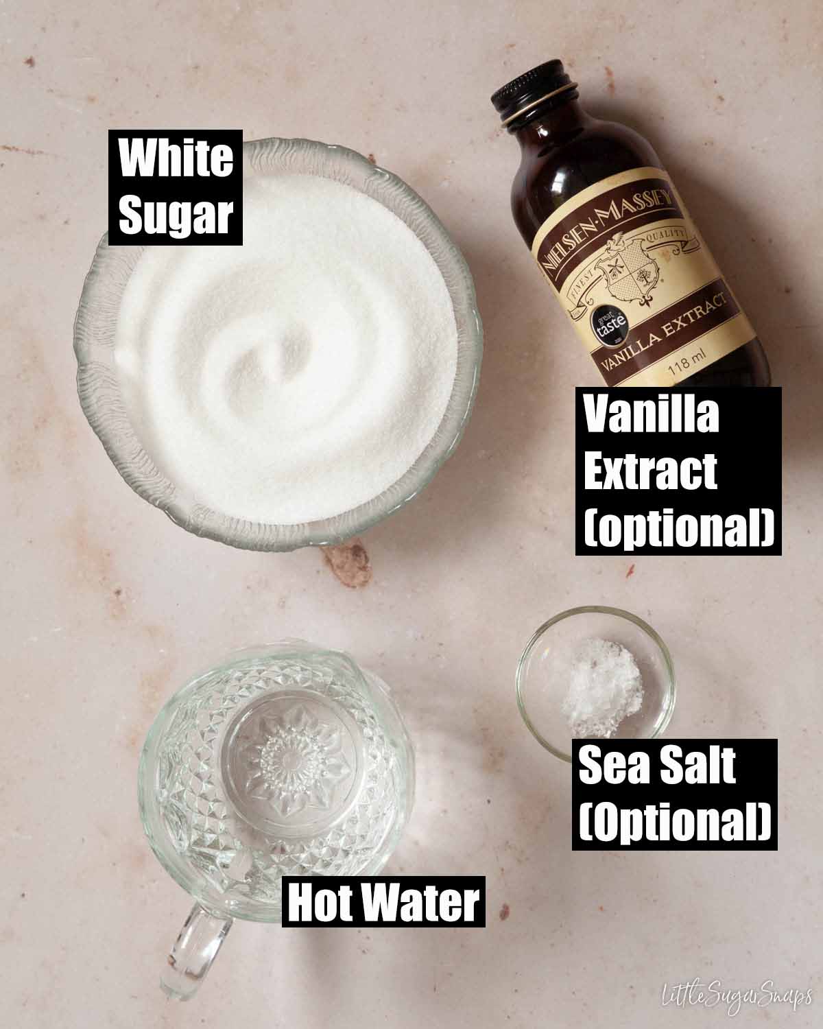 Labelled ingredients for homemade caramel syrup.