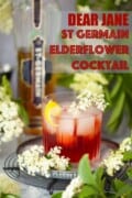 A gin and elderflower cocktail with a bottle of St Germain in the background with text overlay.