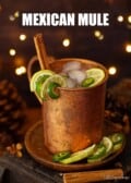 A Mexican mule made with tequila and ginger bear in a copper mug with text overlay.
