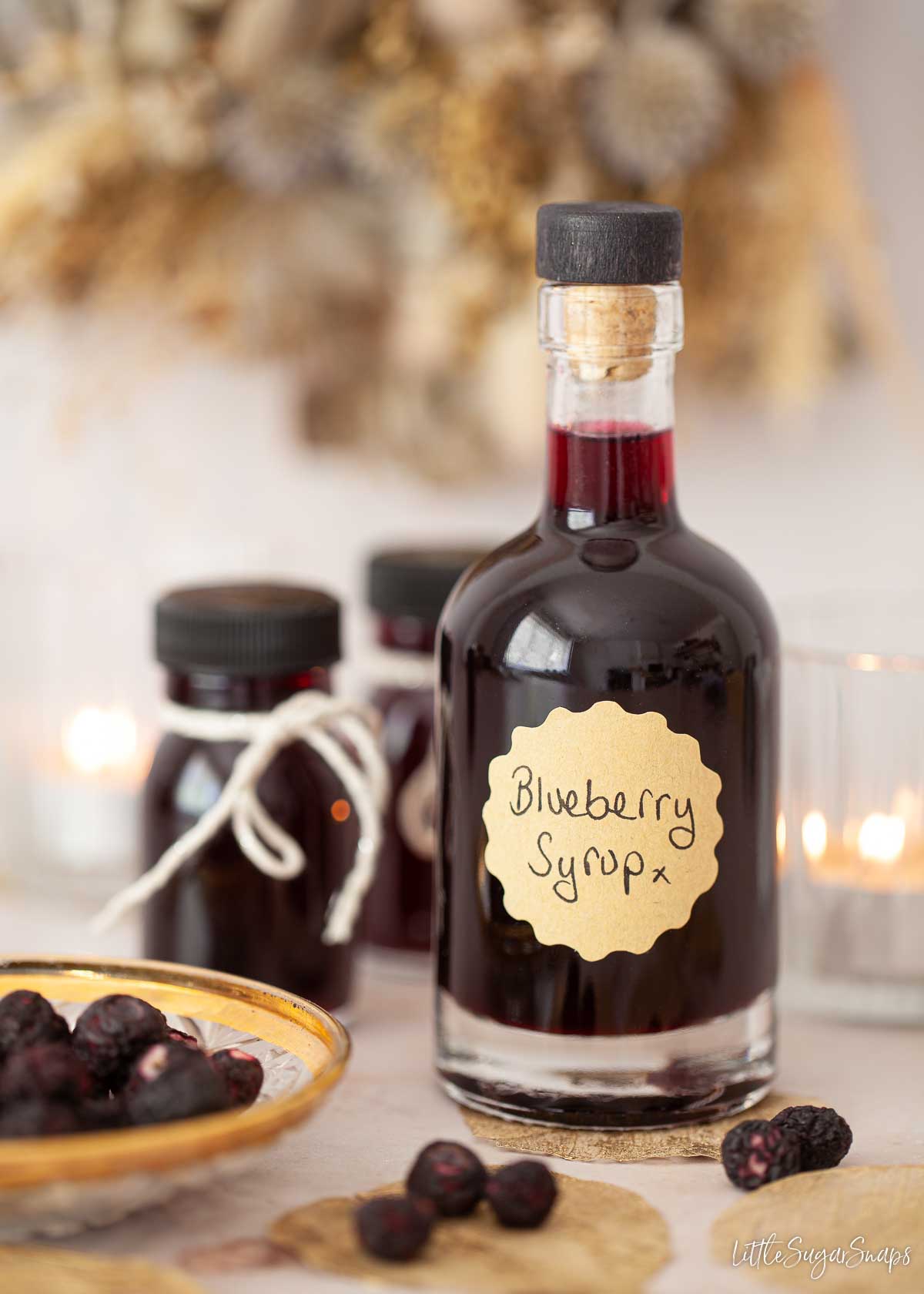 A bottle of blueberry syrup for drinks and cocktails.