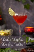 Labelled image of a the Charlie Chaplin vintage cocktail with lime garnish.