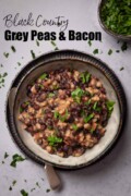 Labelled image of grey peas and bacon in a bowl garnished with parsley.