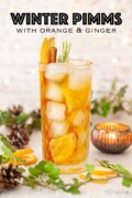 Winter Pimms cocktail in a festive setting with text overlay.