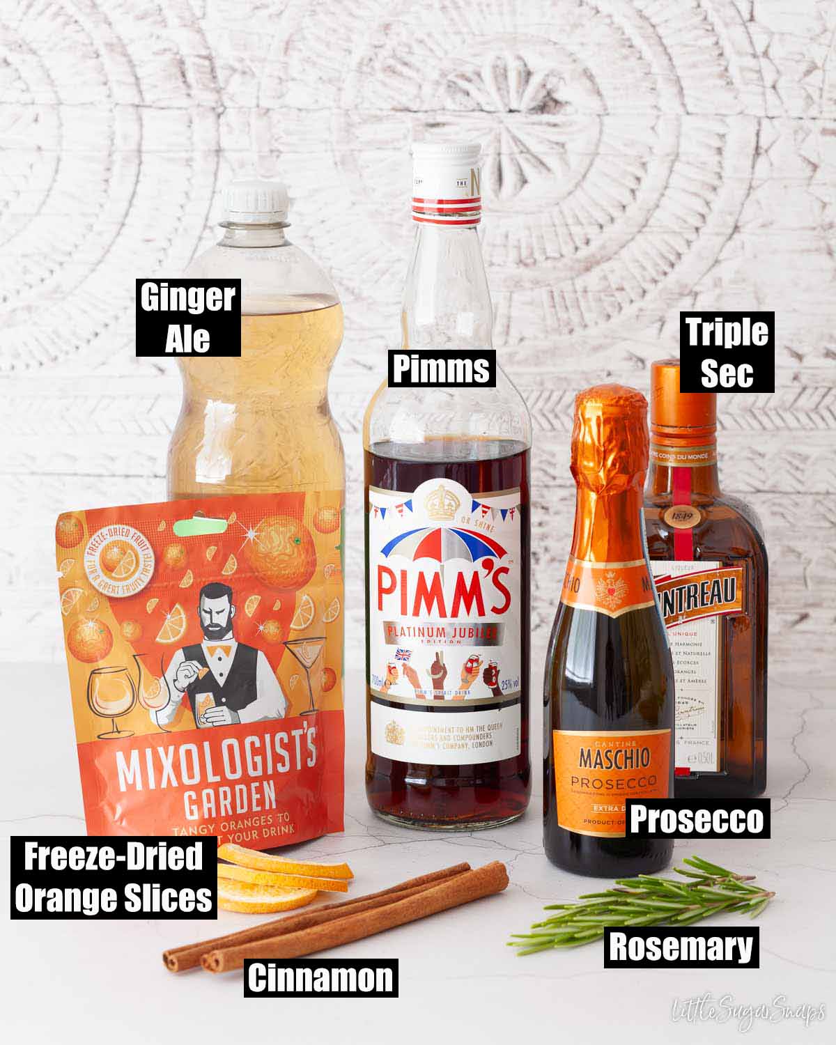 Labelled ingredients for Pimms spritz.