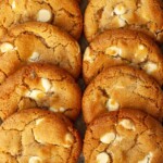 Close up of soft & chewy stem ginger cookies with white chocolate chips.