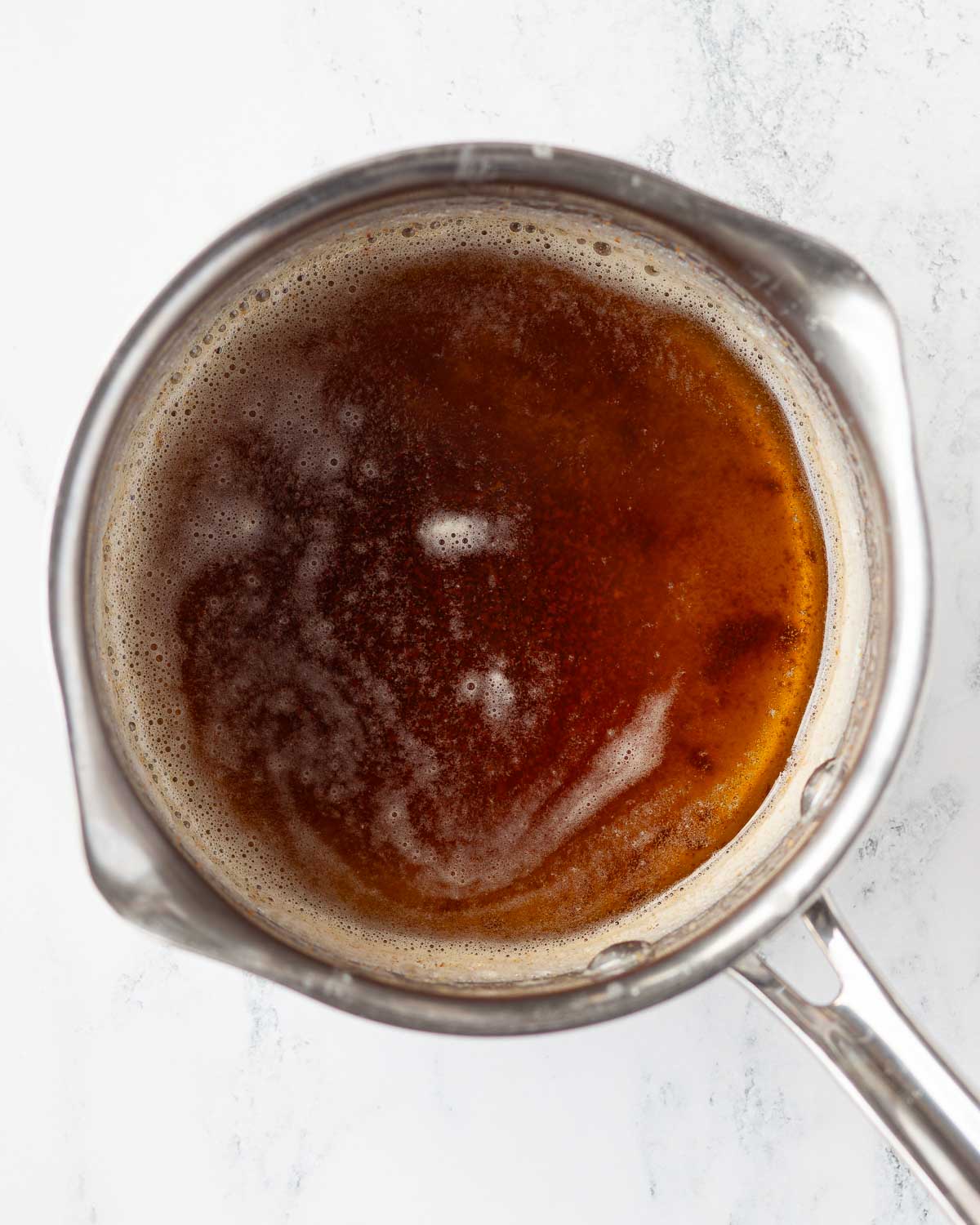 Browned butter in a saucepan.