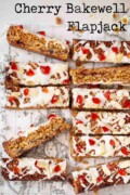 Slices of cherry Bakewell flapjack topped with glacé icing and candied cherries with text overlay.