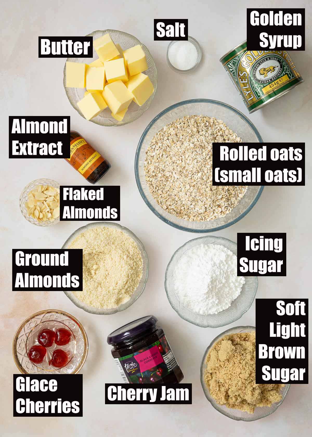 Labelled ingredients for cherry Bakewell flapjack.
