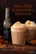 Labelled image of salted caramel mocha drinks in glass mugs with whipped cream.