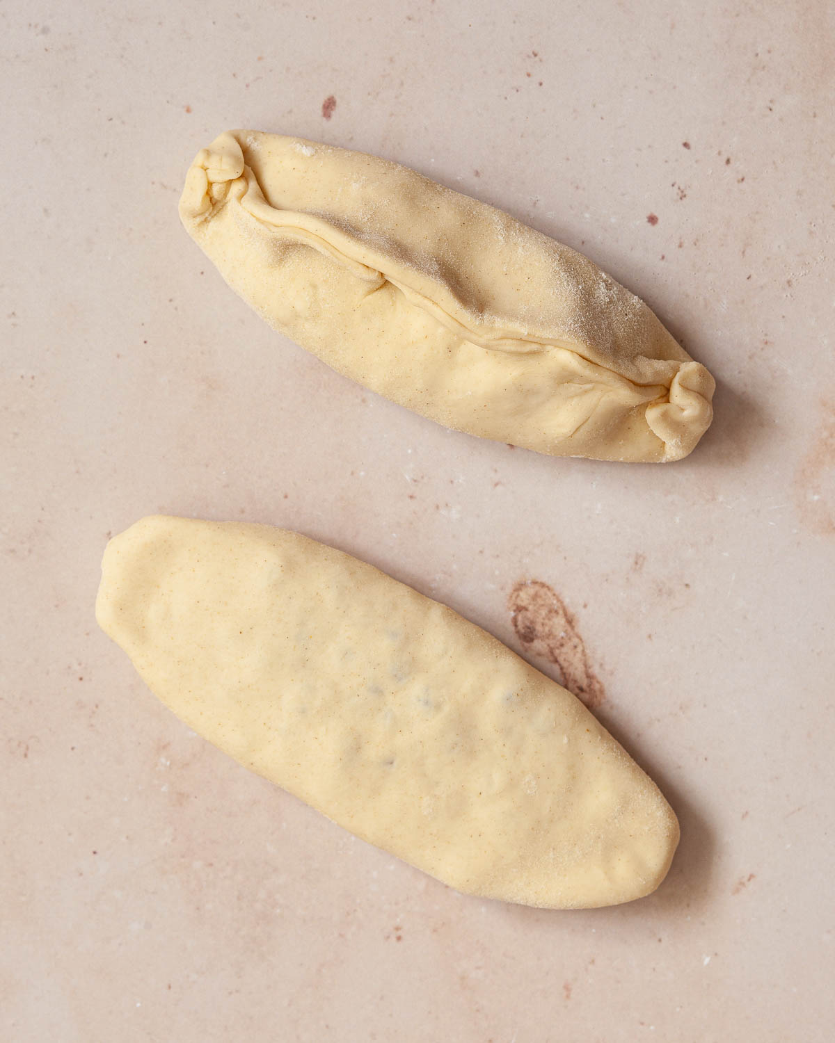 Banbury cakes in the making: pastry being shaped into ovals.