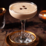 A creamy after dinner cocktail with nutmeg and coffee bean garnish.