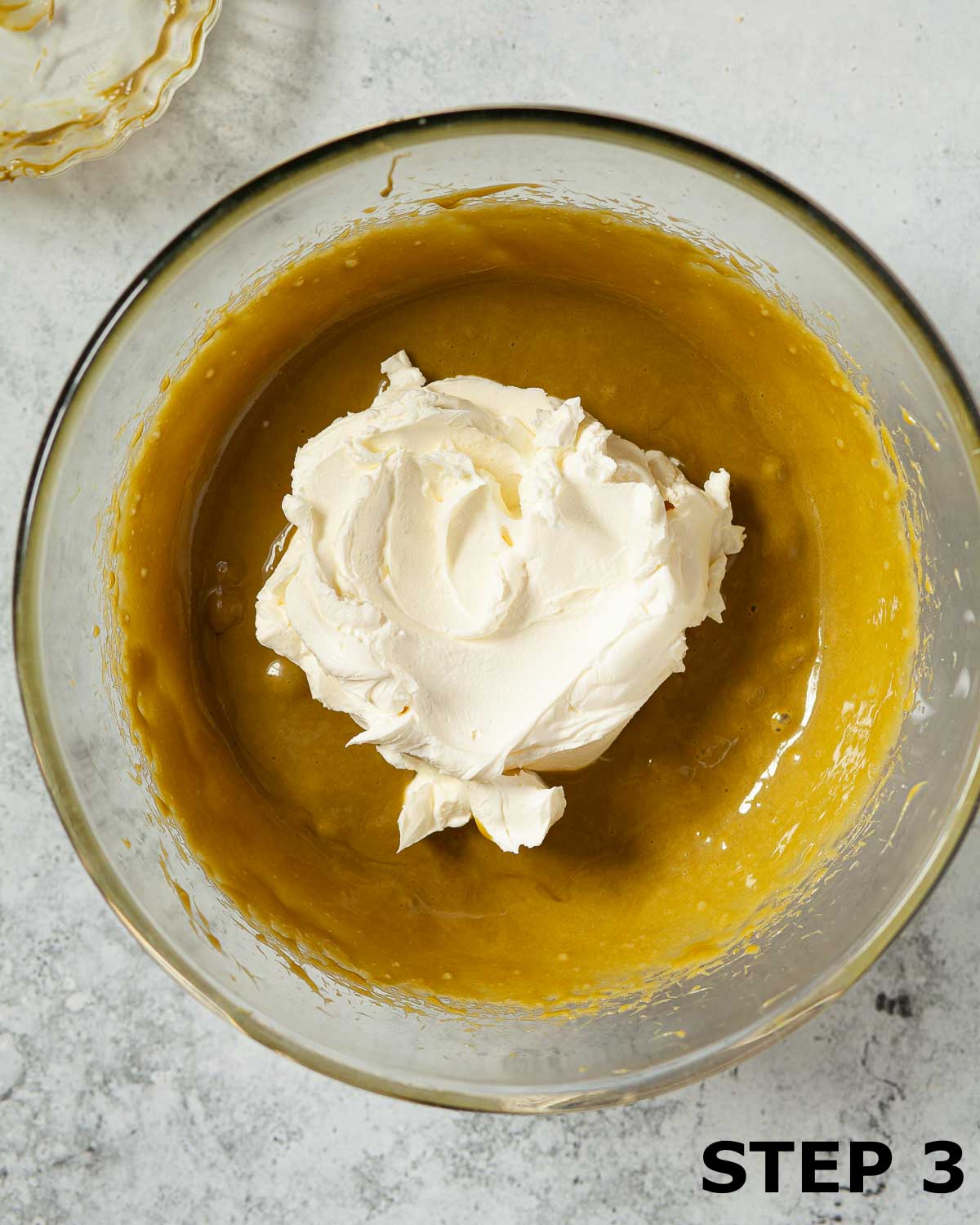 Sweet pistachio mixture with mascarpone cheese in a bowl.