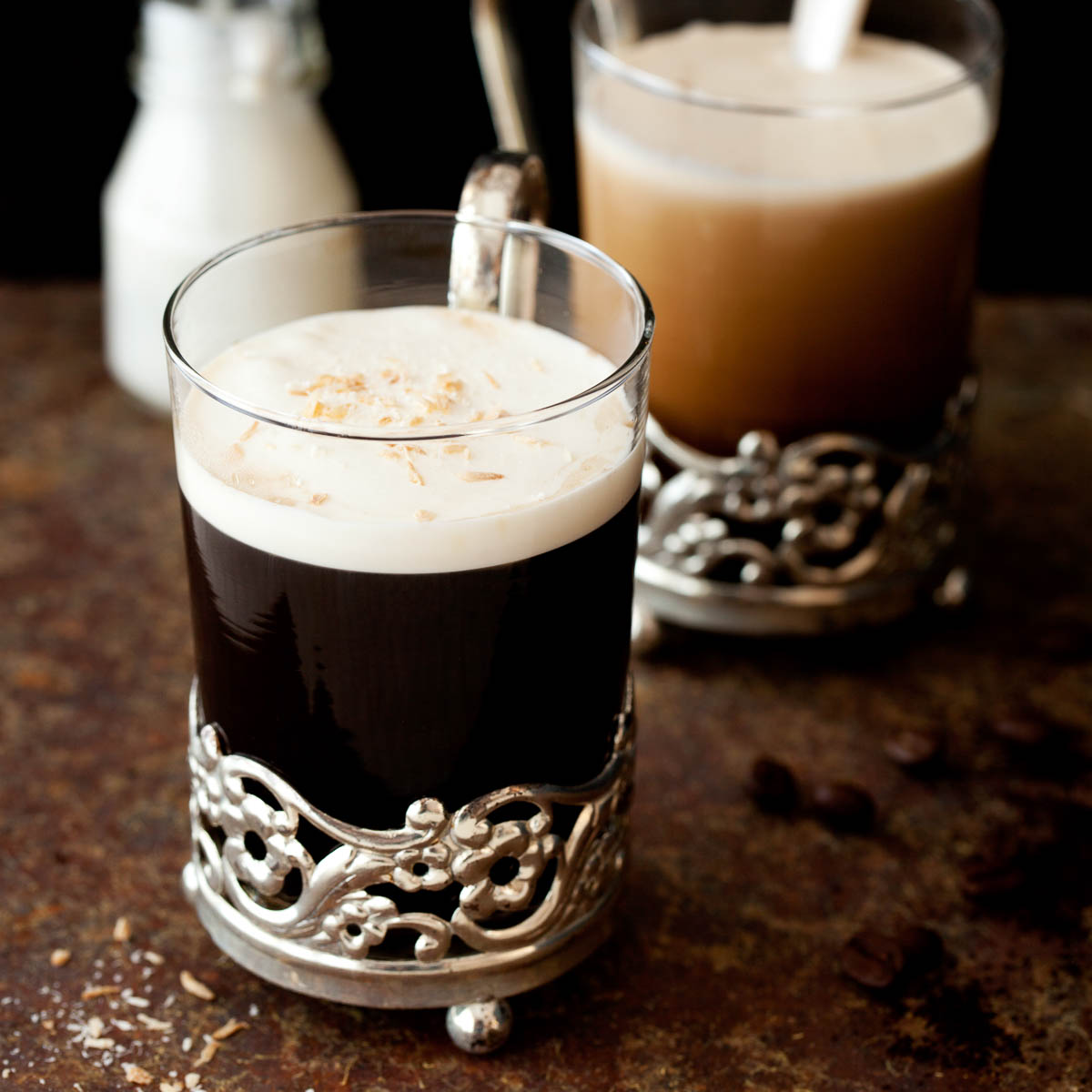 Coconut Liquer coffee in glass mug and vintage metal holder