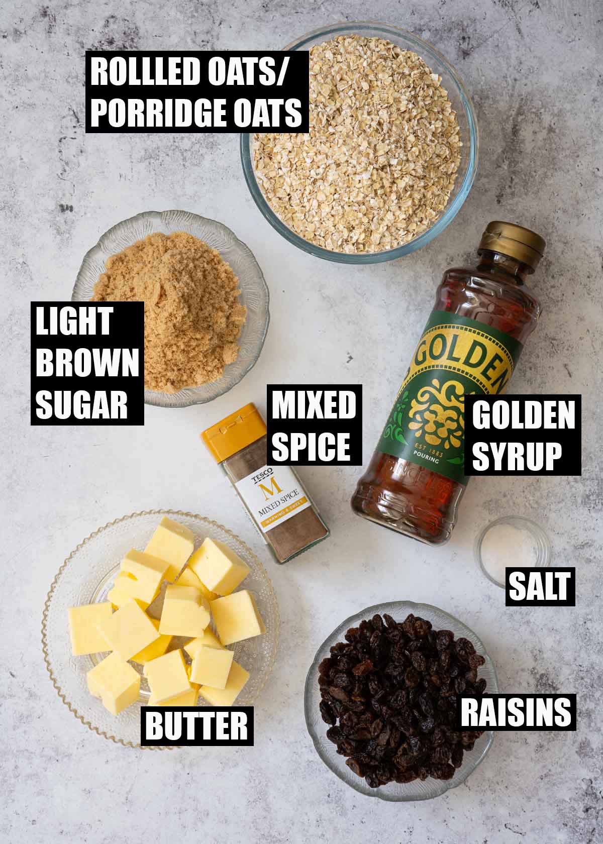 Labelled ingredients for fruit flapjack with raisins.