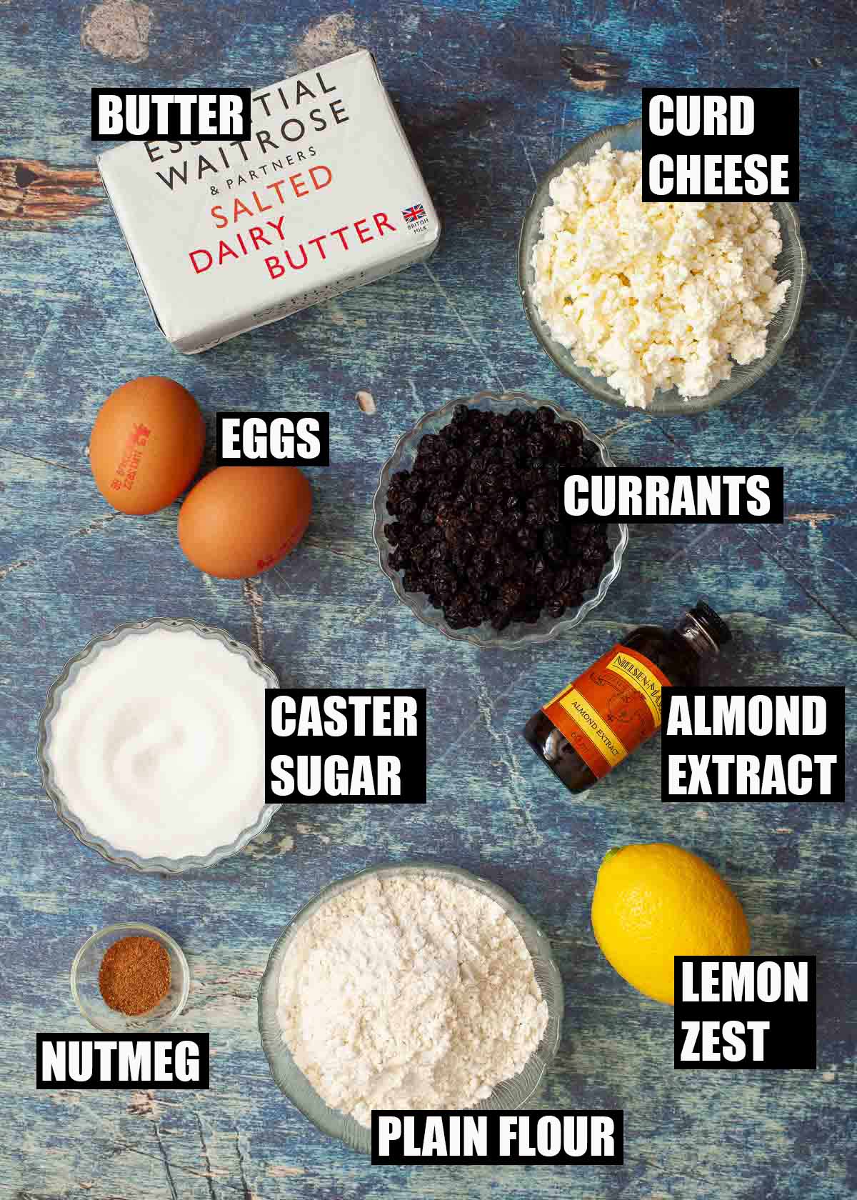 Labelled ingredients for curd cheesecakes with pastry cases.