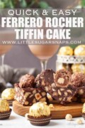 Labelled chocolate tiffin cake with Ferrero Rocher chocolate garnishes with chocolate liqueur in the background.