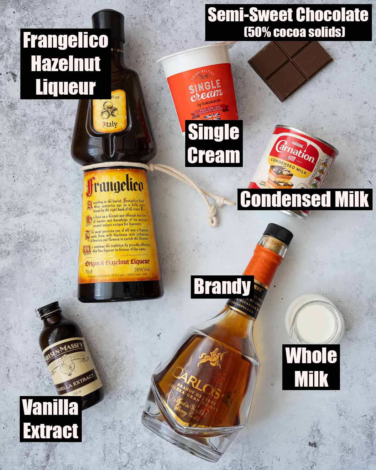 Labelled ingredients for homemade hazelnut chocolate liqueur drink.