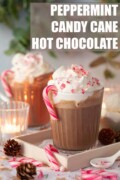 Labelled Candy cane hot chocolate topped with whipped cream, crushed candy cane and marshmallow.